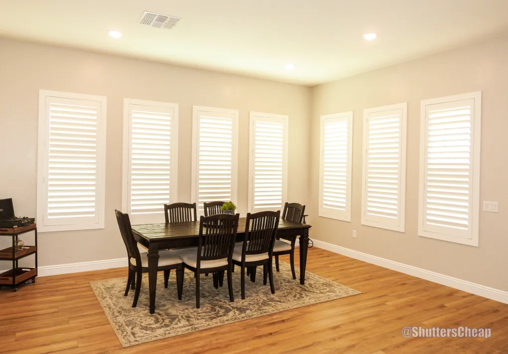 Formal dining room with shutters